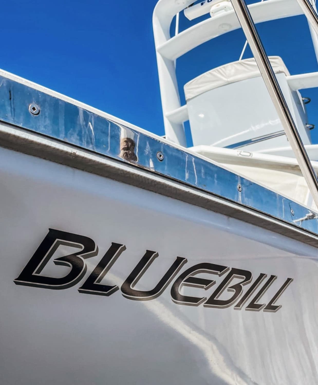 Bluebill's name lettered on the bow below the tuna tower
