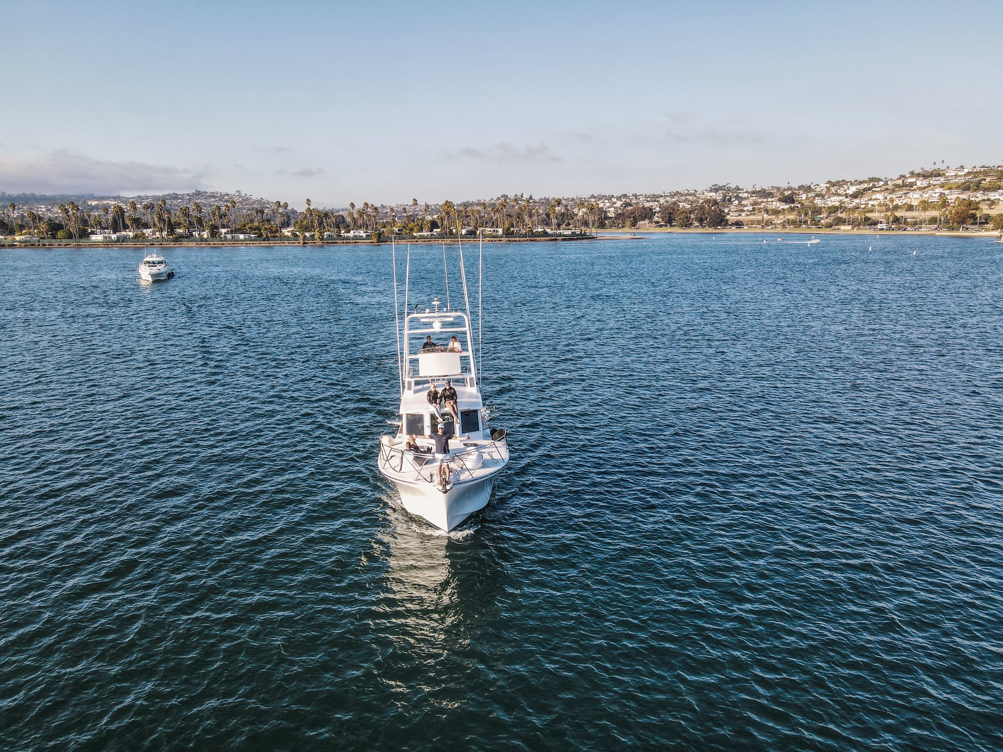Aerial view of Bluebill's bow cutting through the bay underway